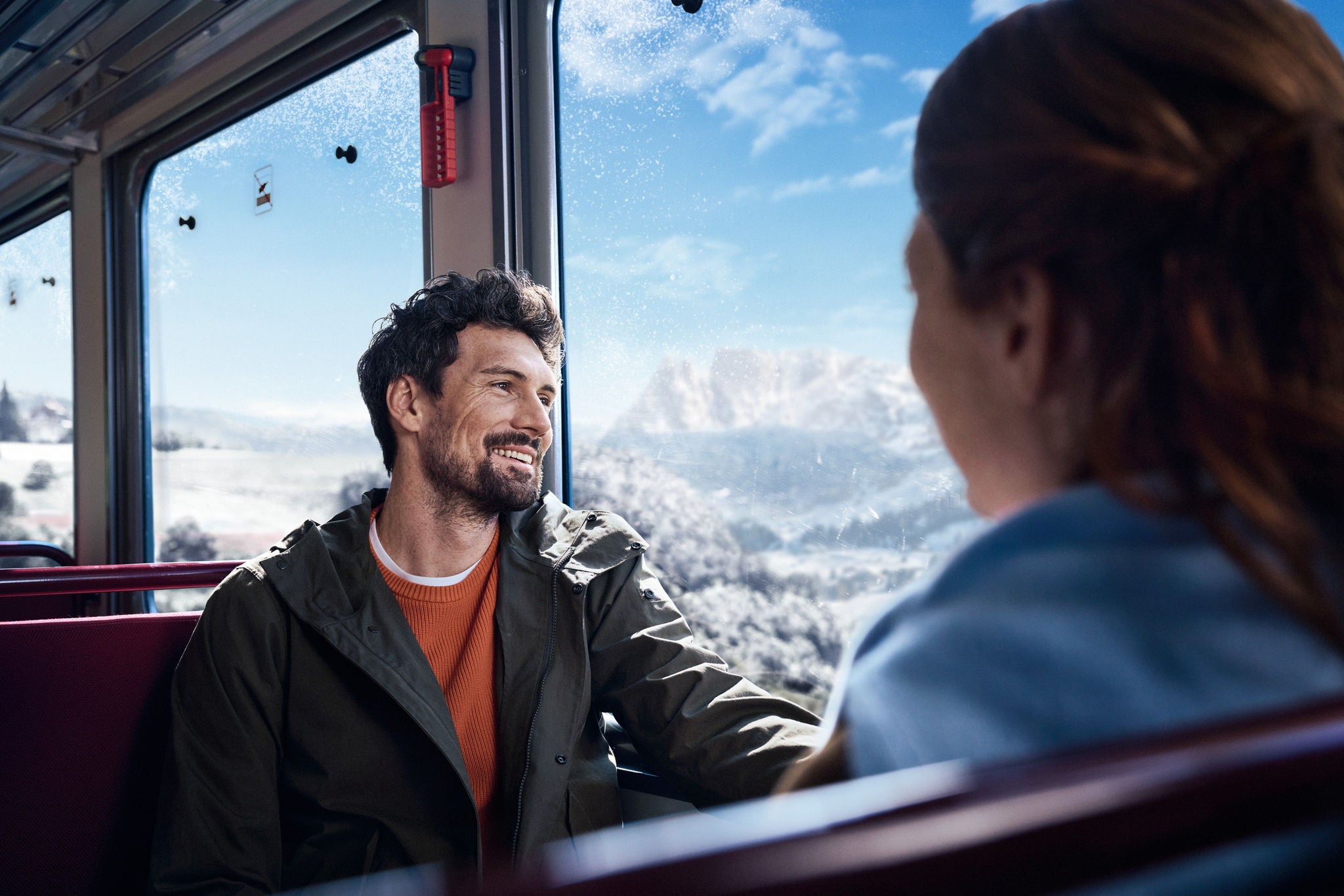 Bahnfahrt mit Dolomitenblick